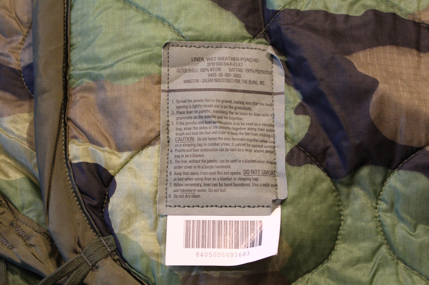 Wet Weather Poncho Liner- USGI -Woodland Camo Grade A.