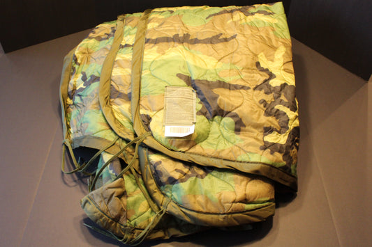 Wet Weather Poncho Liner- USGI -Woodland Camo Grade A.